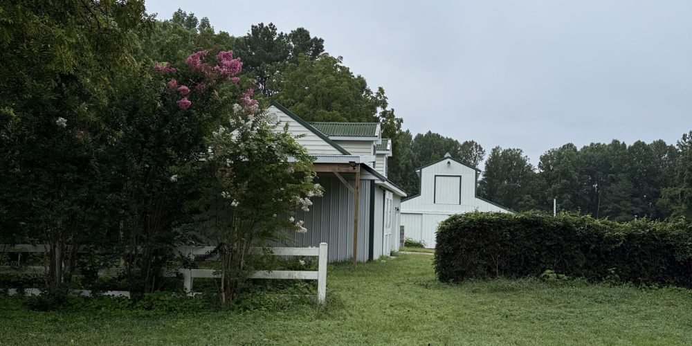 farmhouse with greenery