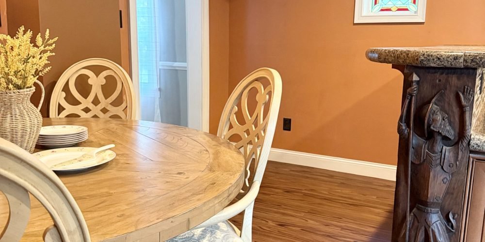 Dining area with wooden table at Blooming Farm