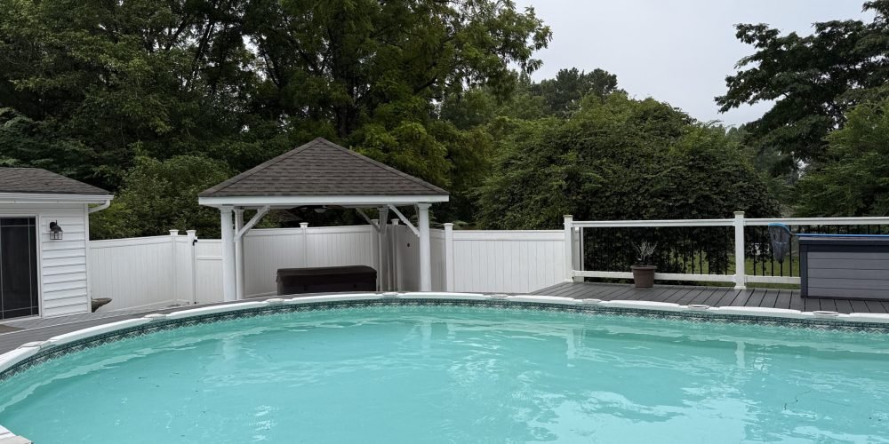 swimming pool by gazebo